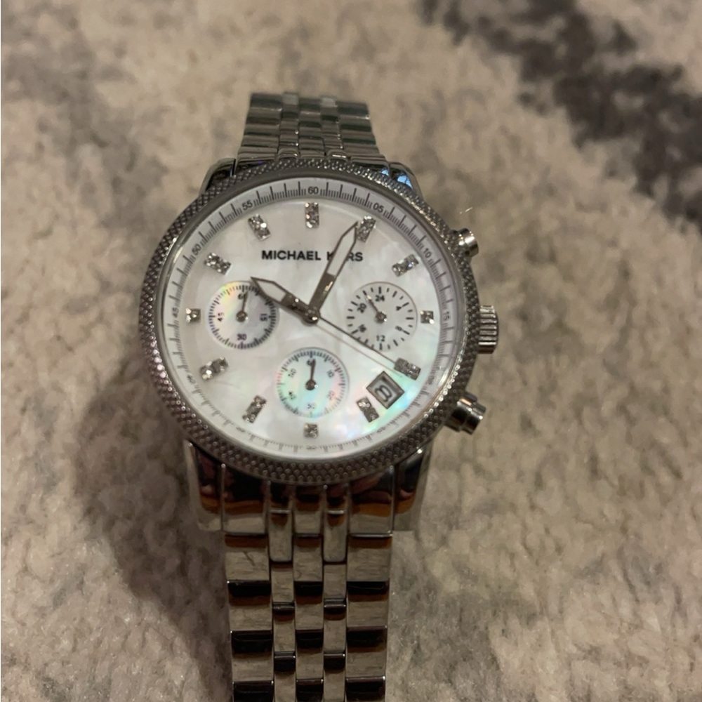 Woman’s stainless steel Michael kors watch